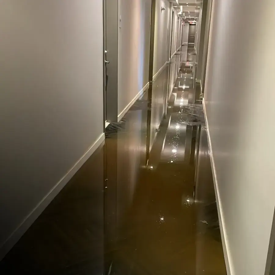 Air movers drying a wet Orem floor after a water loss